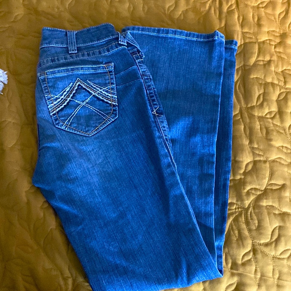 Pretty new Ariat jeans. Worn 2xs. Smoke free home. No rips no stains